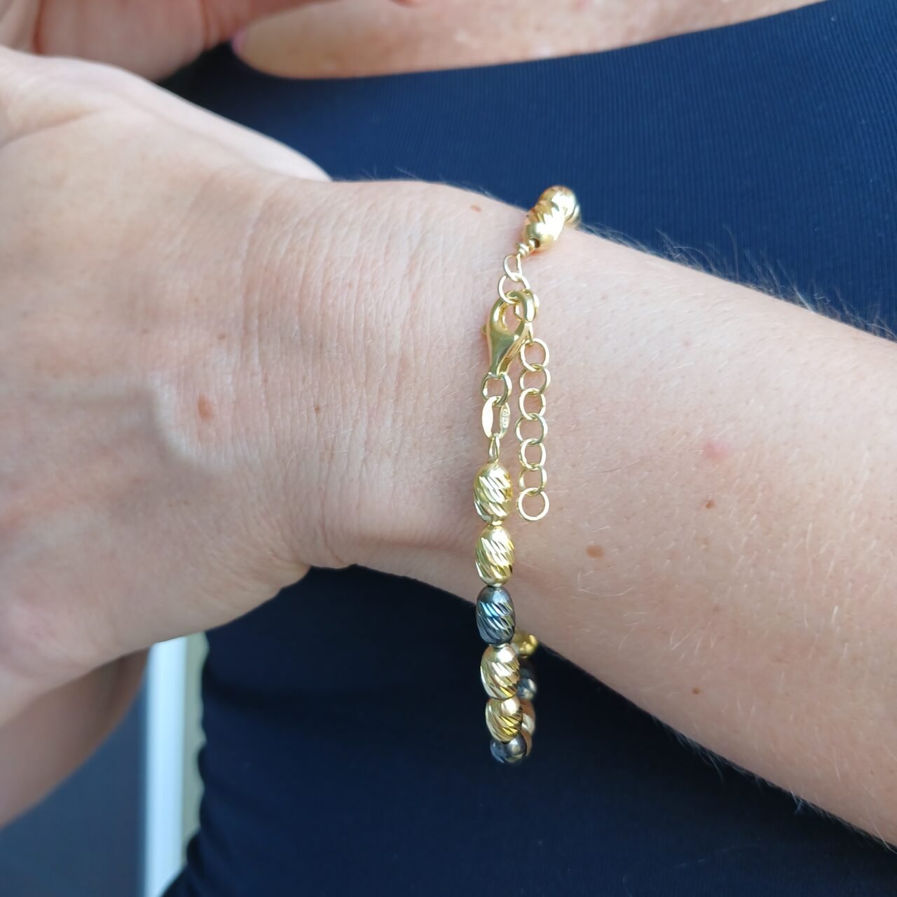 Bracciale granelli dorati e antracite-modello Aurora