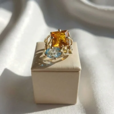 Anello in Topazio Giallo carrè e Topazio Azzurro ovale modello- numero 15