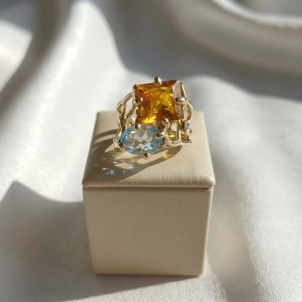 Anello in Topazio Giallo carrè e Topazio Azzurro ovale modello- numero 15