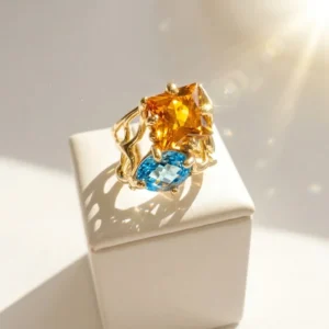 Anello in Topazio Giallo carrè e Topazio Azzurro ovale modello- numero 16